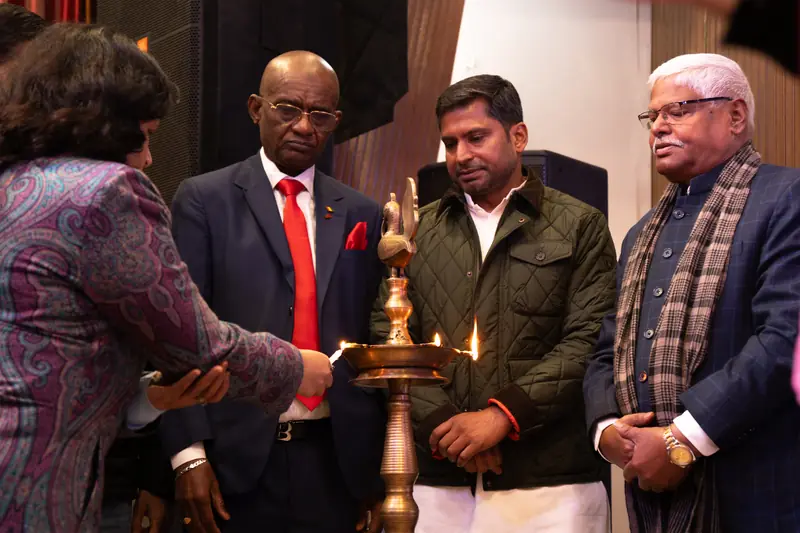 Guests of honour lighting the ceremonial lamp